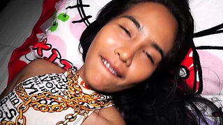 Guy feeding a hot Thai teens hairy pussy