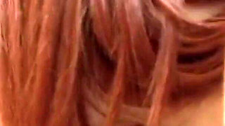Brunette and redhead lesbian licking each other's pussy