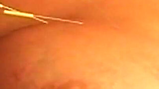 Busty Blonde MILF Submits to Intense Needle Play