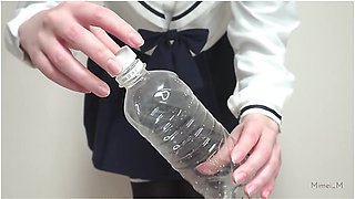 Cute Japanese Schoolgirl Tries To Pee In A Plastic Bottle