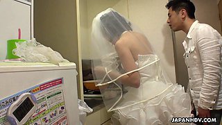 Japanese bride Ruri Narumiya bends over being fucked doggy style