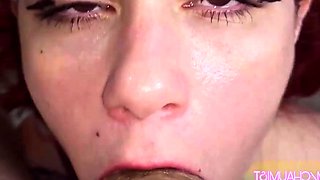 Redhead gives blowjob until she gulps cum