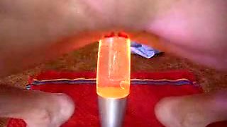 Pierced girl fucks her pussy with a lamp in hot solo scene