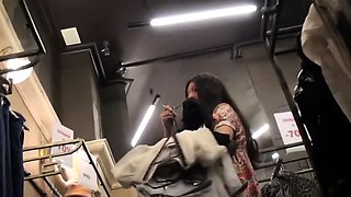 Stunning brunette in tight panties upskirt in a public place