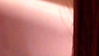 Cute brunette lesbians pleasuring each other in the bathroom