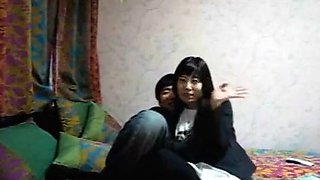 Chinese couple bedroom blowjob