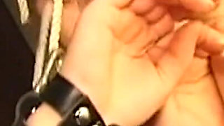 Chained Mature Brunette MILF Endures Nipple Weights and Spanking