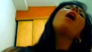 Squirting webcam babe with her cat