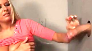 Wife through glory hole in the toilet sucks big dick.