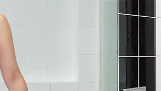 Teen Masturbates Using the Shower Jet