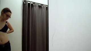 Busty girl with glasses milks a cock with her lips in public