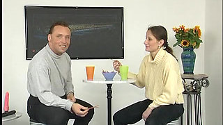 MILF sucks a huge dildo then sits on it having it deep in her pussy