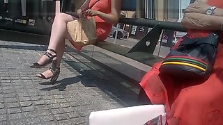 Sexy legs waiting for the bus