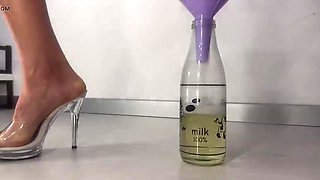 Hairy Mature Wife Peeing in a Bottle Through a Funnel