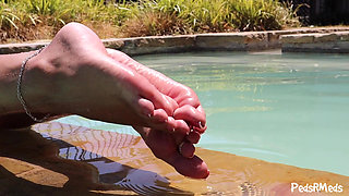 Eyecandytoes Relaxing in the Pool