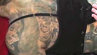 Tattooed Slut Blows Multiple Cocks in Car and Gets Her Face Covered in Cum