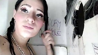 Latina emo deepthroats huge cock through gloryhole