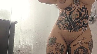 Tattooed Slut Soaps up in the Shower