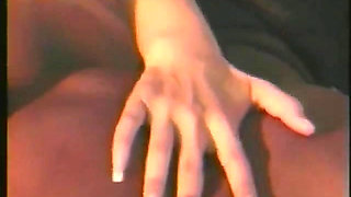 Muscular Stranger in White Superhero Mask Drills Ebony Chick on the Parking of Shopping Mall