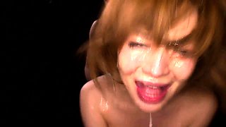 Attractive Japanese lady with perky boobs is a bukkake lover