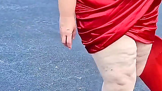 Beautiful Woman Walking Outdoors in Parking Lot Showing off for Strangers