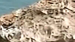 Horny Redhead Babe Fingers Pussy on Wild Beach