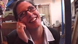 Brunette wearing glasses gets her crotch fingered to orgasm