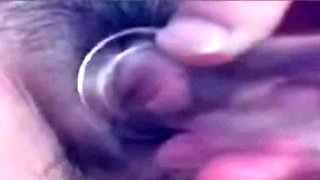 a woman pumps her clit into a dick