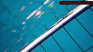 Perfect shaved teen in the pool