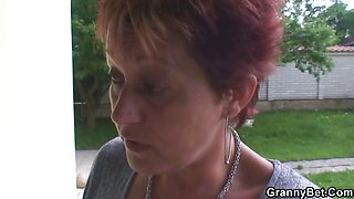Granny rides neighbour\'s big cock