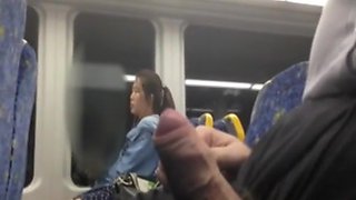 Chinese girl looking at my cock at the bus