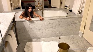Mia Khalifas Big Tits Soak in Steamy Shower