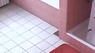 Amateur blonde masturbates on toilet