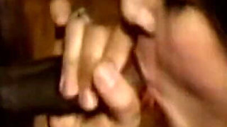 Sultry Brunette MILF Devours Throbbing BBC in Retro Passion