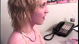 Short-haired slut energetically rubs her moist shaved twat then dildo fucks it