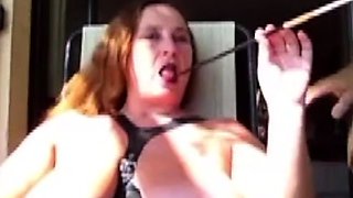 Big tit brunette amateur fucks a dildo close up