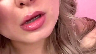 Yawning Blonde with Glasses in Slow Motion