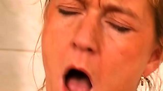 Horny blonde cougar tongues big boobed African girlfriend.