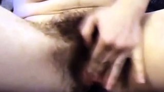 Webcam Hairy playing with big clit