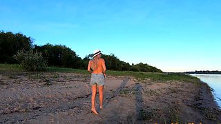 Russian Nudist on the River Shore