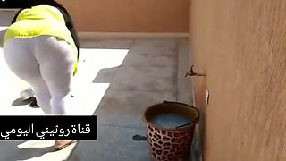 Arabic gal isn't aware that a mischievous neighbor is gazing at her monstrous donk, all day long