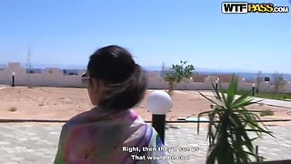 Hot and sensual brunette in bikini gives head in public