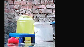 The village woman bathes in the open, undresses, entices everyone