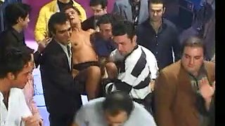 Italian MILF enjoys a bukkake gangbang