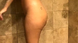 Busty curly brunette with big boobs fucks on couch