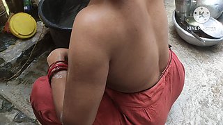 Indian Woman Washing Outside