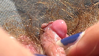 Amateur Hairy Girl Mastubates in Closeup with Huge Clit