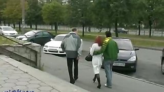 Cool red girl sucks a prick in the back seat of the car