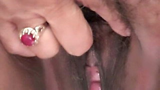 Pissing in a public bathroom. 67yo mature woman.