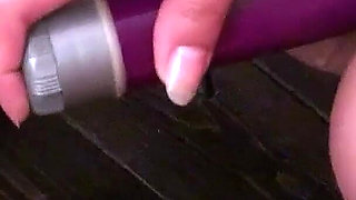 Kinky nurse Amber filmed masturbating with toys